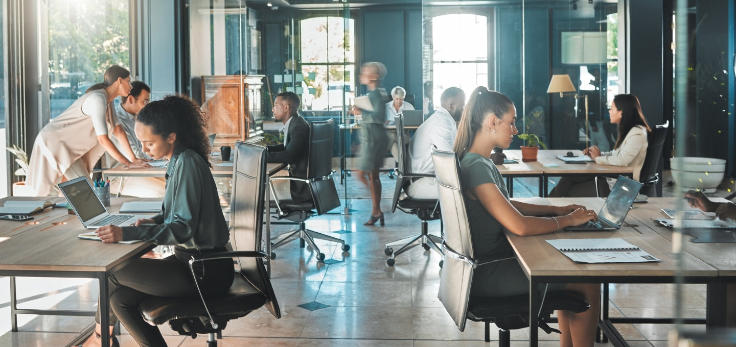 A group of people sitting at tables